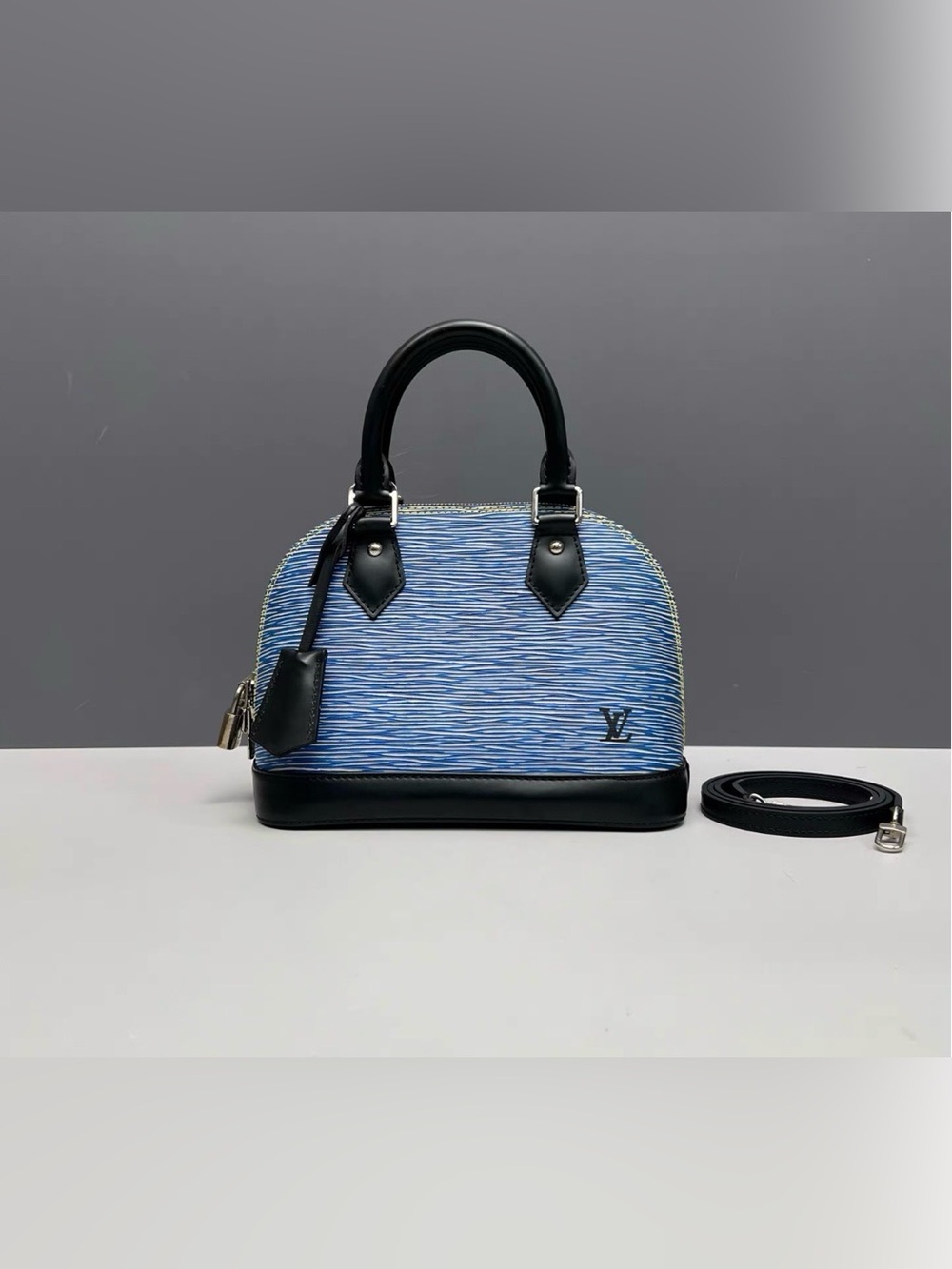 Louis Vuitton Blue Epi Alma PM Satchel with Black Trim